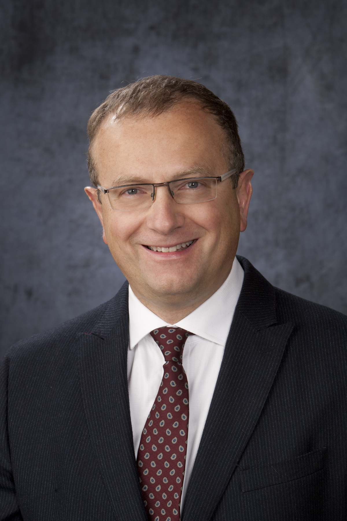 Adrian Caracioni MD
